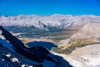 View of Lake Magog and the Assiniboine huts from Strom's south ridge. The Hind hut is also visible in the shadows.