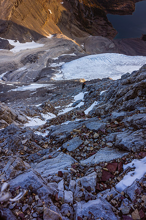 Climbing to the red band on the north ridge of Assiniboine.