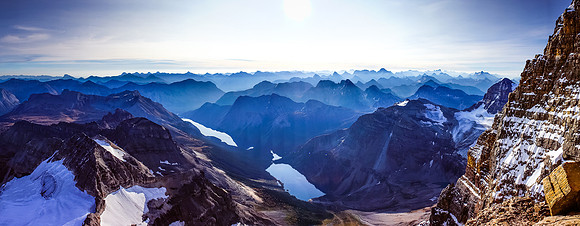Spectacular views across the east face. Lakes Gloria and Marvel on the bottom left. Forest fire smoke from the USA lingers over the ocean of peaks in the distance.