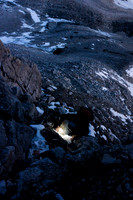 Kev climbing via headlamp on the lower ridge.