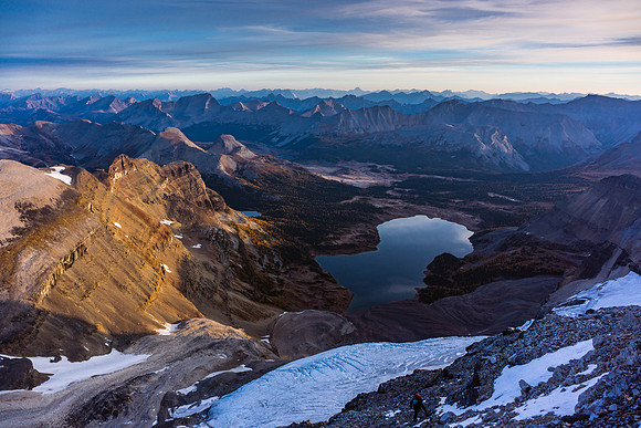 Kev on the lower north ridge with Sunburst, The Nub, Golden, Nasswald, Wonder and Cave Mountain.