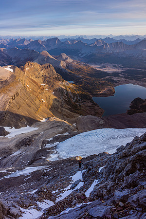 Climbing to the red band on the north ridge of Assiniboine.