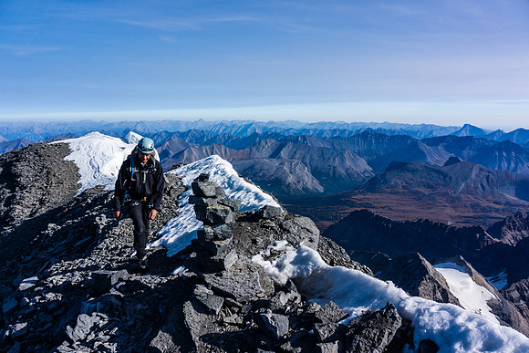 Kev approaches the summit of Mount Assiniboine.