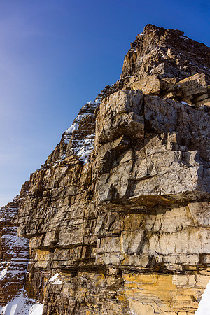 The spectacular east face of Assiniboine as seen from the NE ridge. Note the excellent, blocky climbing on the ridge.