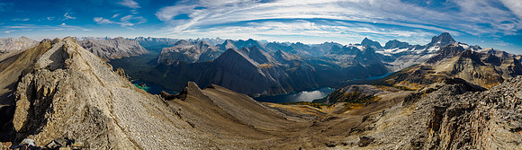 Views to Mount Assiniboine over Wonder Pass and Marvel Lake (L).