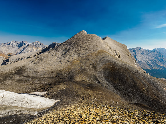 Traversing to a higher outlier peak east of Ely's Dome.