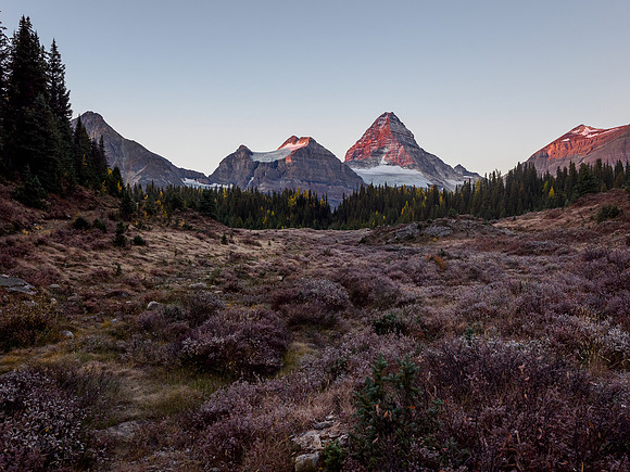 Early morning hike from Og Lake to Lake Magog. Sunrise on Mount Assiniboine.