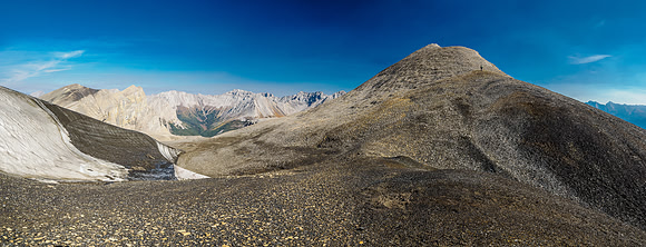 Traversing to a higher outlier peak east of Ely's Dome.