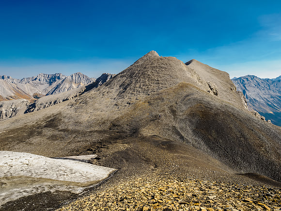 Traversing to a higher outlier peak east of Ely's Dome.