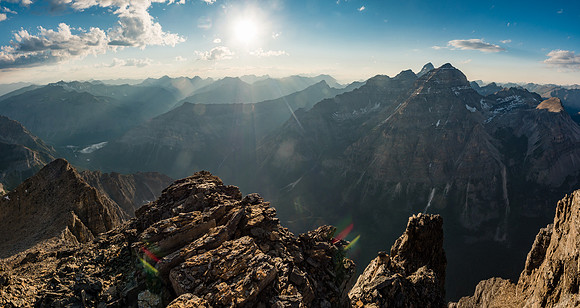 The sun relentlessly sinks to the west, but we're not too concerned as we have a pretty quick and easy descent down a SW facing gully straight to our bivy.