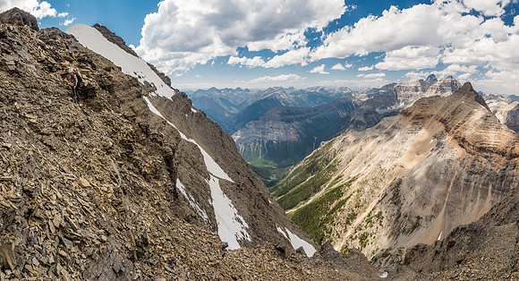 Scrambling up to the ridge just before the summit with our approach valley far below us now.