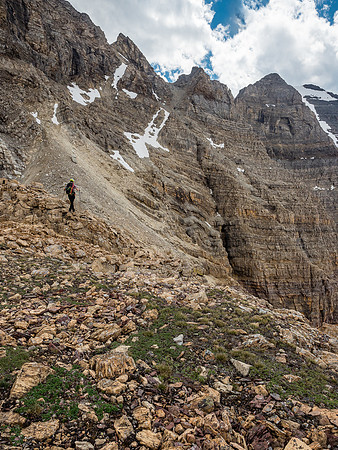 Phil marches along the col towards Brussilof and our ascent line - now clearly just above him to the right.