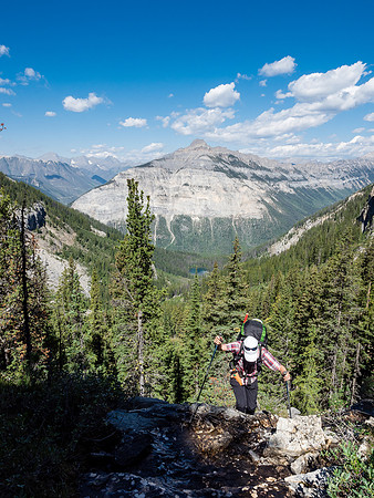 Looking back as Phil crests the cliff band. Note the first lake visible behind us here.