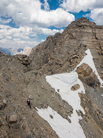 Phil follows me across the first steep ledges as we traverse to the NE ridge.