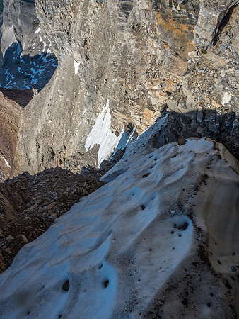 Working our way carefully down the snow gully. We had to be extra careful about pulling huge rocks down on ourselves or each other on this scramble.