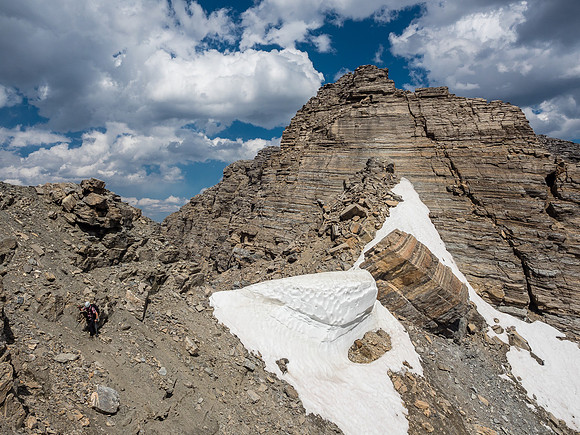 Phil follows me across the first steep ledges as we traverse to the NE ridge.