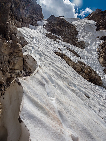 Now we're cooking with gas! Looking up the snow gully - some sections were quite steep where we used the rock wall at left to assist over vertical steps.