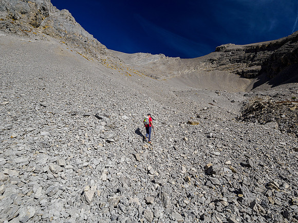 Hiking up a south rubble bowl under Nasswald Peak.