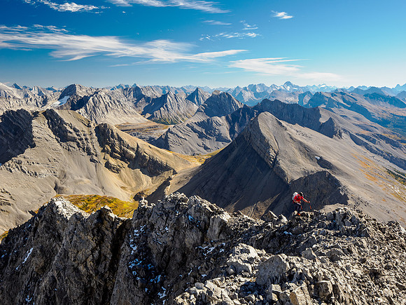 Scrambling the loose and exposed upper SE summit ridge.