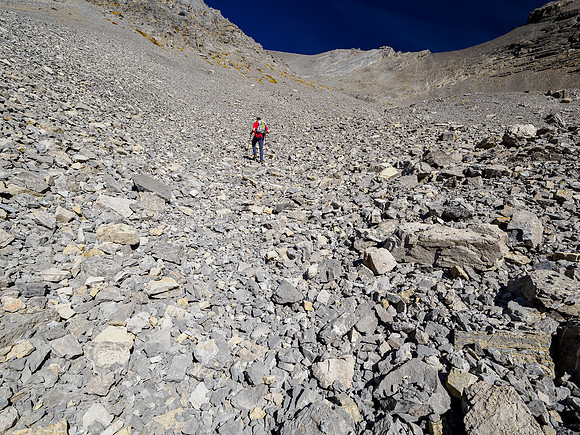 Hiking up a south rubble bowl under Nasswald Peak.