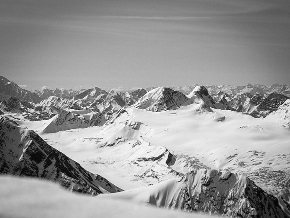 Mount Mummery and the Freshfield Icefield to the south over the summit cornice.