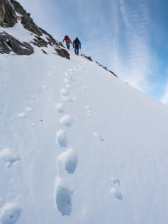 Mike and Anton bypassing the rock band on the west ridge, just beneath the summit shoulder.