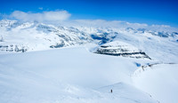The slopes near the summit are steep. Ferenc comes up the summit block beneath me. We skied right to the summit ridge.