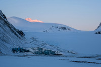 Our peak rises at upper left with alpineglow.