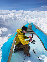 Setting up the tent when we get back - the tent pole was made from my ski poles so we had to collapse it during the day