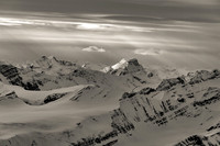 Bras Croche is a distinct peak at center catching some sun with Farrar and Mallory on the left.