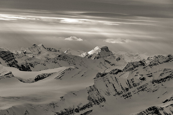 Bras Croche is a distinct peak at center catching some sun with Farrar and Mallory on the left.