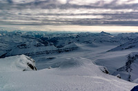 King and Queen Peak of the Chess Group at foreground with the Sullivan River Valley beyond at left and Tsar at distant right.