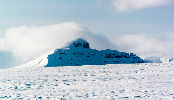 Castleguard Mountain still looks like a mountain. In a few hours it'll look like nothing more than a bump on the ice field.