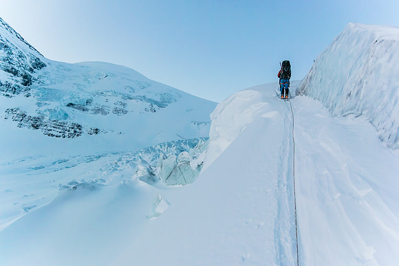 Sometimes you have to get creative to get through the icefall. This ramp was perfect except the 40 foot crevasse just off to our left.