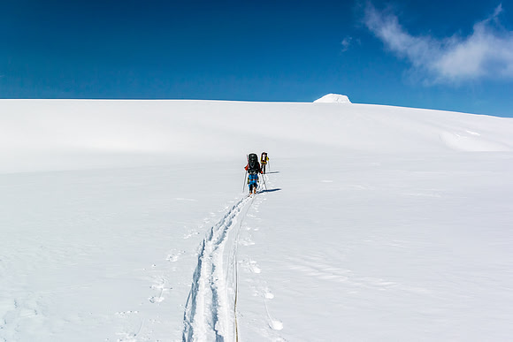 Time to grunt back up the far side of the trench - our destination just peaking out above us now.