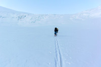 Heading for the almost indistinct ramp - just above Ben and Steven in the distance and looking much smaller than it is.
