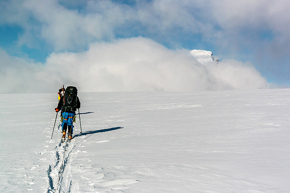 Mount Columbia is already peeking out of the clouds but it's many kilometers away at this point.