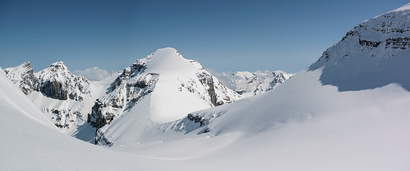 The steep avy traverse to the Cromwell / Stutfield NE col is obvious and has holes along it too. The other option is descending beneath the col and then climbing back up to it - but you're still expo