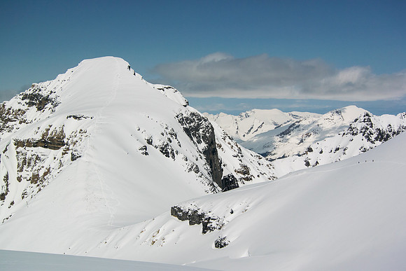 The boys ski up Stutfield NE behind me.