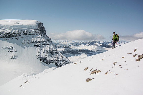 Steven descends the ridge beside me, while I ski it.