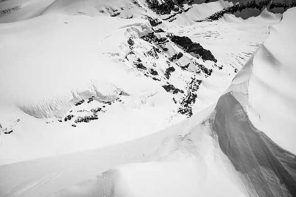 Very exposed off the summit looking wayyyy down to the SE.