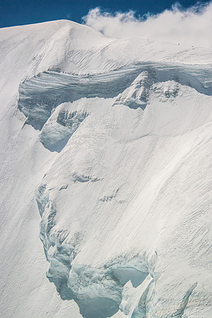 The CSMC group following our tracks high on South Twin's north ridge.