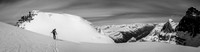 JW skis to the South / West Twin col. The summit of West Twin on upper left, Twin's Tower on upper right.