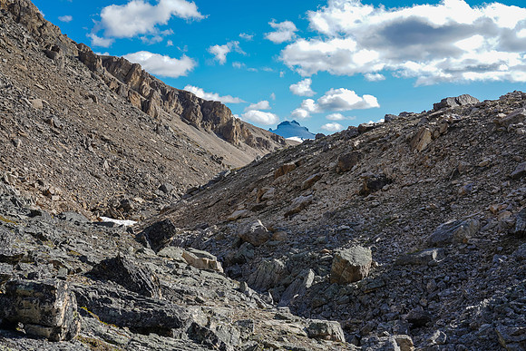 A steep grunt from the tarn to the top of the col.