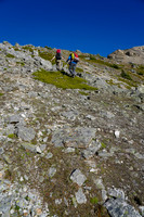 A steep grunt from the tarn to the top of the col.