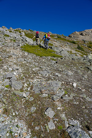A steep grunt from the tarn to the top of the col.