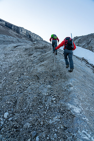 Ascending scree / slabs and frozen dirt to the Deluc Glacier.