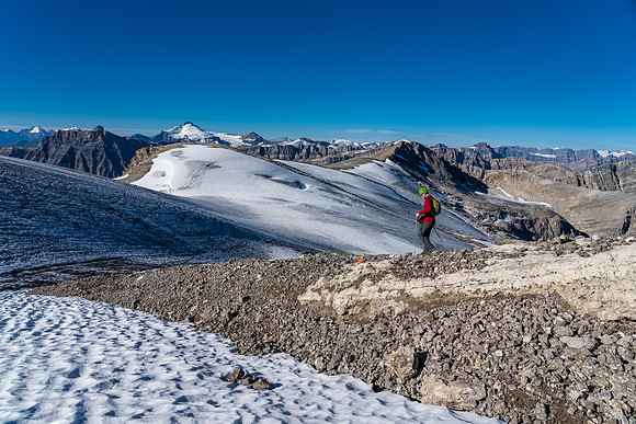 Descending the SW aspect of Deluc to the glacier.