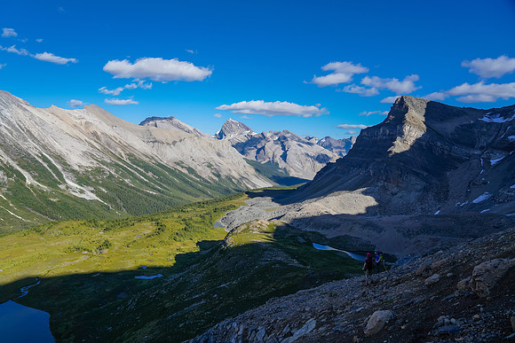 Descending steep scree slopes to the Pipestone River Valley.