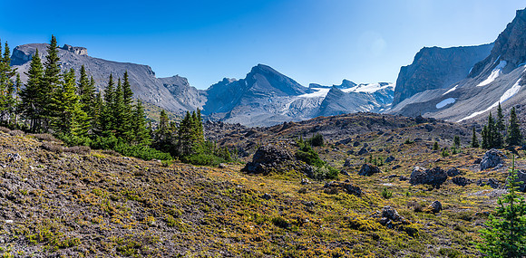 Gorgeous alpine terrain on a warm September morning. Deluc rising at center.